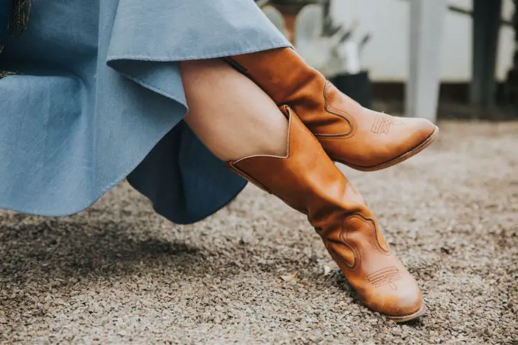 Denim skirt with cowboy boots