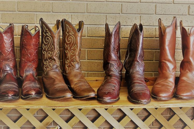 Different types of cowboy boots in the house