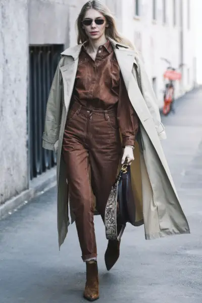 A woman wear beige blazer with sleek outfit and brown cowboy boots (2)