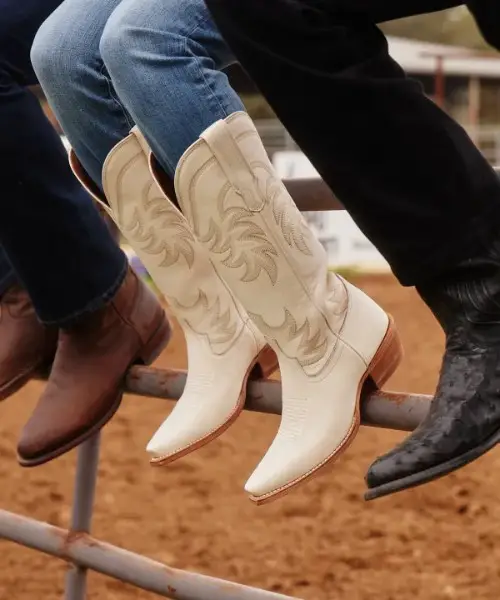 A woman wears jeans and The Annie Boots