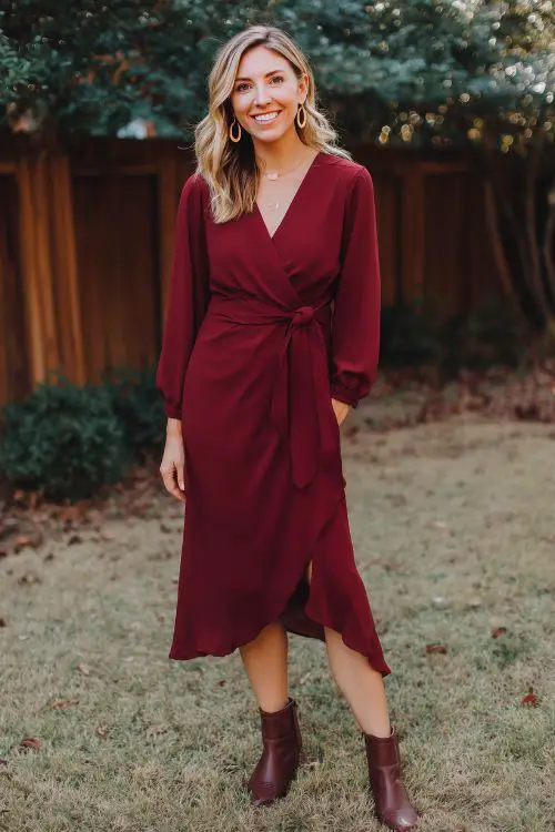 A burgundy wrap dress is a flattering favorite for midsize guests attending cozy barn weddings or backyard fall ceremonies