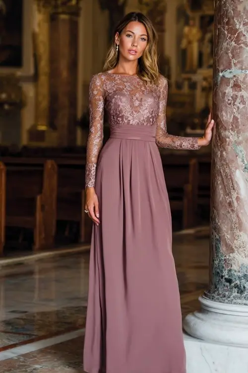 A woman wears a floor-length mauve gown with lace sleeves and a flattering empire waist