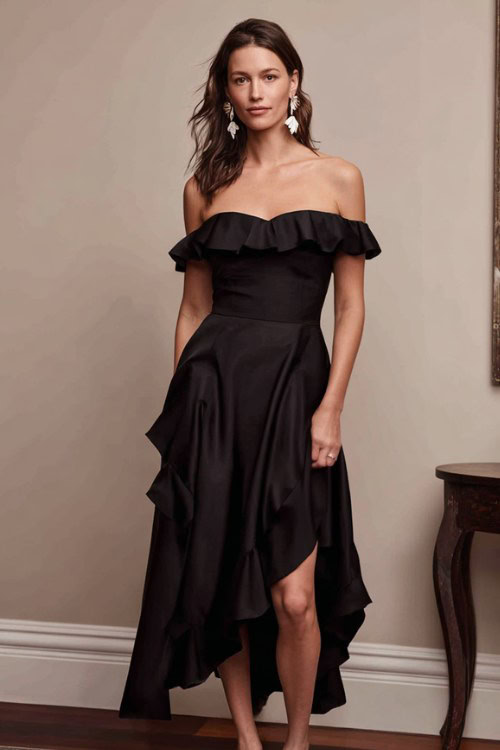 a woman wears a black guest dress for November wedding