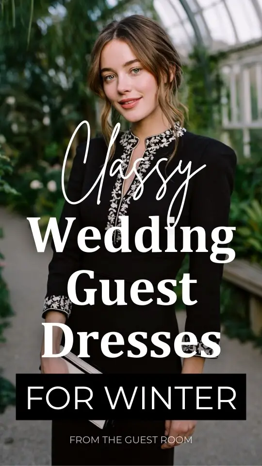 A woman at a classy wedding guest dress for winter featuring white embroidery along the neckline and cuffs