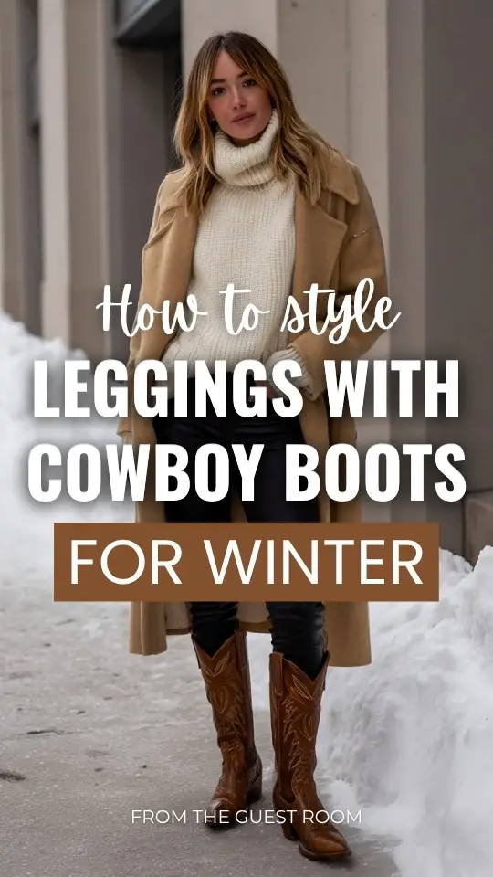 A woman wears leggings with cowboy boots outfit for winter, paired with an oversized cream turtleneck sweater, layered with a long camel coat