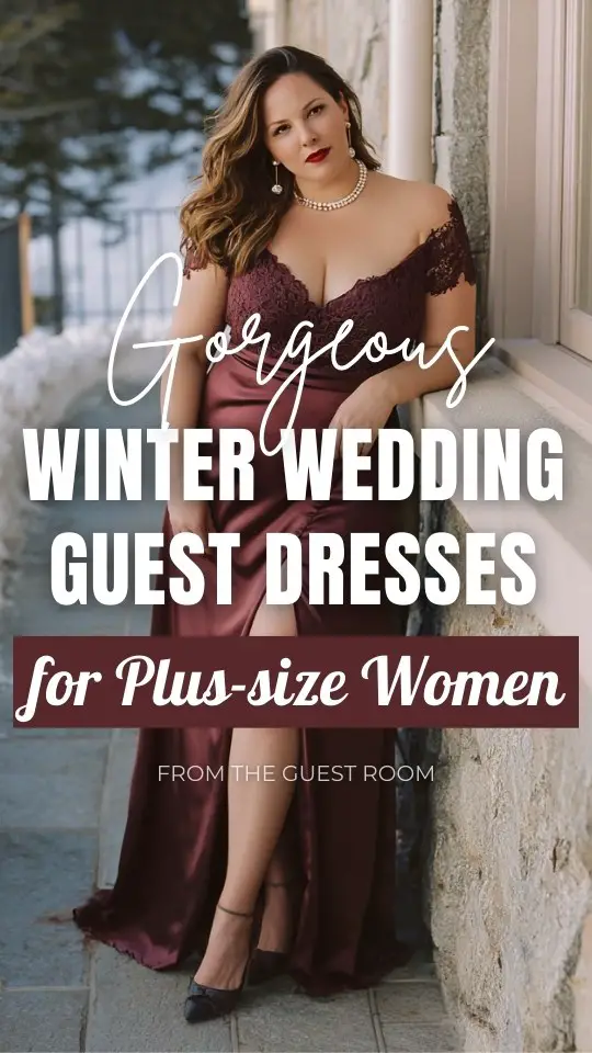 A plus-size woman wears a sophisticated burgundy satin winter wedding guest dress with subtle train and lace sleeve accents, paired with refined heels and pearl jewelry