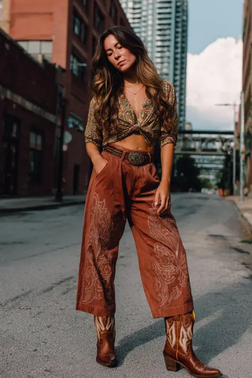 woman in baddie brown cowboy boots outfit on the street