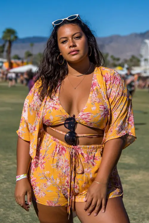 a woman wears a floral set at festival