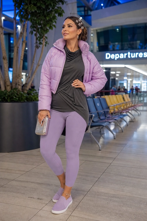 Lavender puffer jacket and matching leggings styled with a charcoal draped top and platform sneakers.
